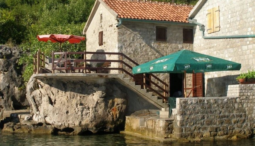 Charming stone house with boat pier near Tivat
